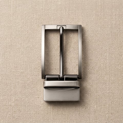Stepped nickel reversible belt buckle on linen