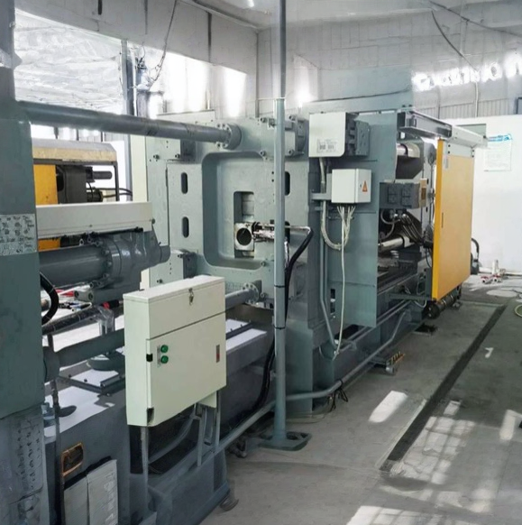 High-pressure Zamak die-casting machine on the TAJ factory floor