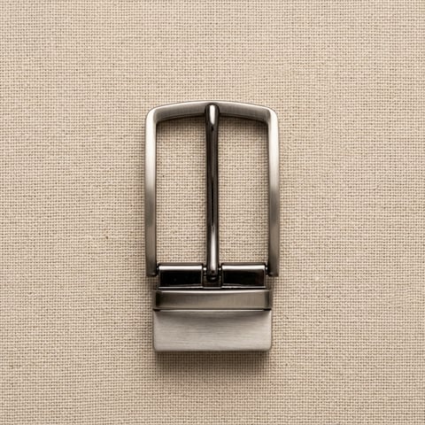 Nickel dome reversible belt buckle on linen