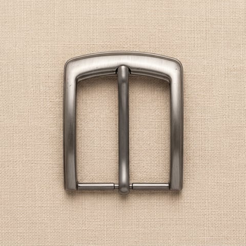 Brushed gunmetal square pin belt buckle on linen