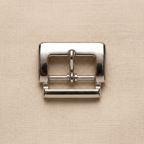 Polished nickel rectangular roller footwear buckle on linen