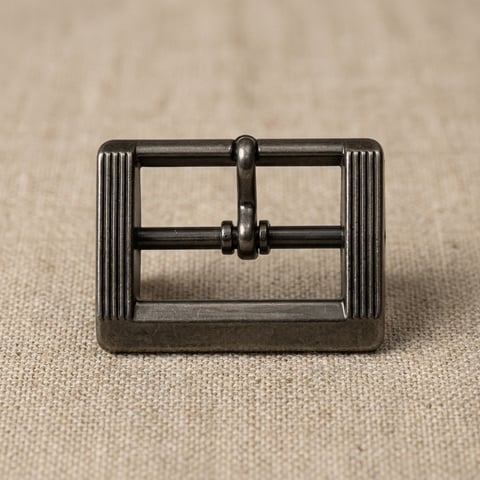 Ribbed gunmetal rectangular footwear buckle on linen
