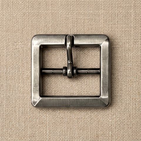 Brushed satin nickel beveled square footwear buckle on linen