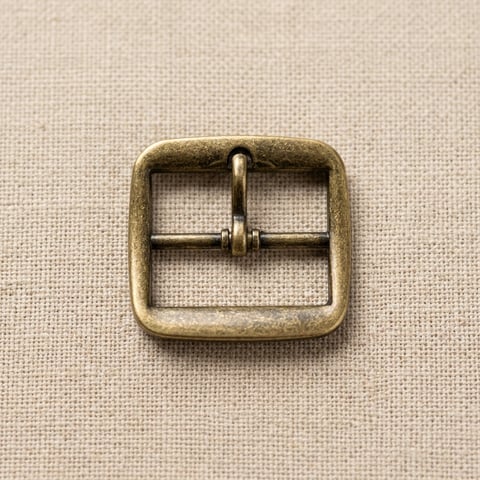 Antique brass cushion square footwear buckle on linen