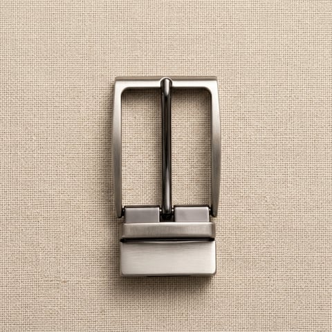 Tapered nickel reversible belt buckle on linen