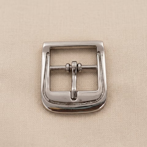 Polished nickel arched square footwear buckle on linen