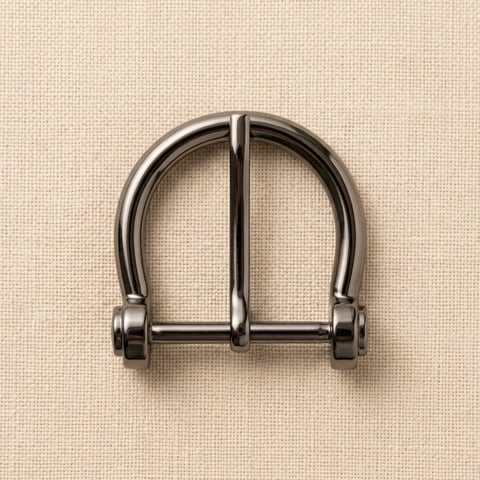 Gunmetal horseshoe roller belt buckle on linen
