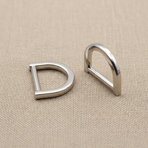 Polished nickel flat D-rings on linen