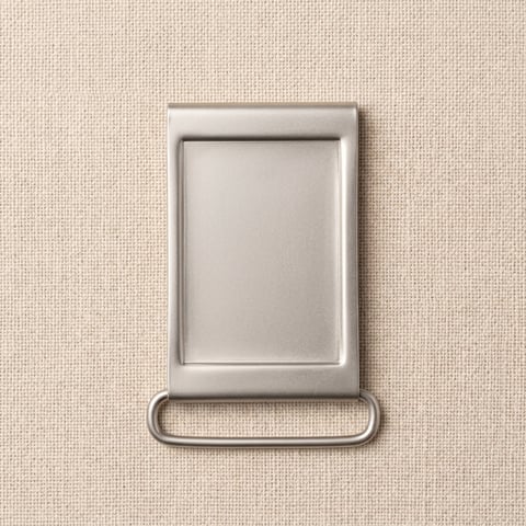 Antique nickel rectangular plate belt buckle on linen